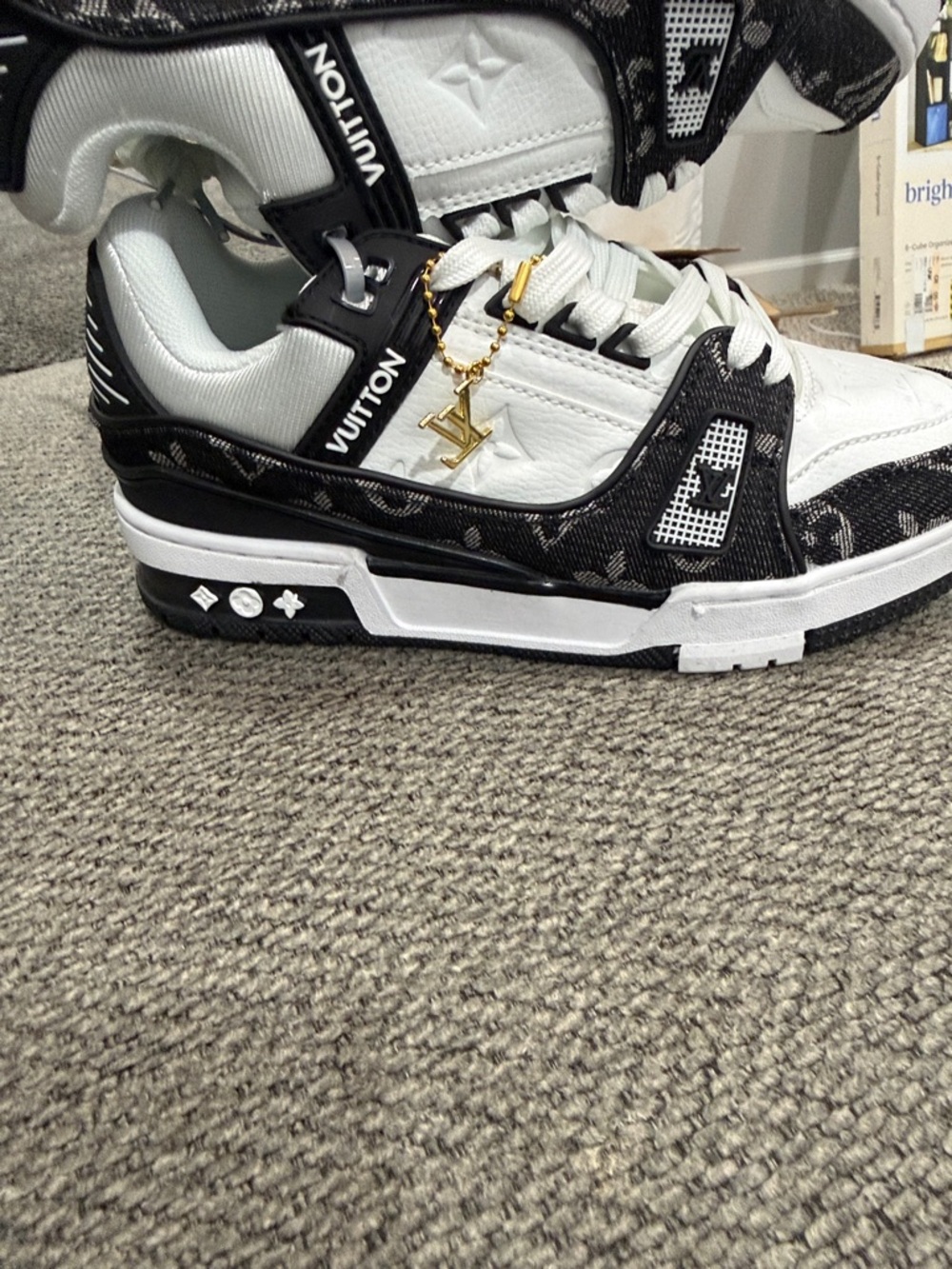 Louis Vuitton Black and White Monogram Low-Top Sneakers with Gold Charm
